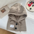 Macro detail of khaki knit balaclava showing thick leaf texture and button closure - One Size / Coffee