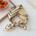 Light yellow cotton paisley square scarf with decorative knots on white background - Yellow Border Paisley