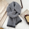 Detail of grey knitted wool scarf with black stripes and a premium metal buckle decoration - Medium Grey