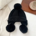 Detailed texture of thick cable knit winter hat with large faux fur earflap pom-poms - 3 Pom-poms Ear Protection Style / Black