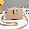 Chic beige lychee textured leather crossbody bag with golden hardware and double zippers - Khaki