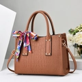 Elegant brown crocodile embossed tote bag with printed silk scarf and adjustable strap - Earthy Yellow