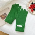 Detail of lime green wool knit gloves featuring a wavy textured cuff and 100% wool label - One Size / Green (5WOOL)