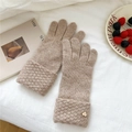 Detail of khaki thick knit gloves with folded cuffs and heart logo on soft fabric - One Size / Beige Coffee