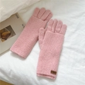 Detail of pink ribbed knit gloves featuring a leather brand tag on a cozy white background - One Size / Double Layer Dual Use / Pink