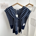 Detailed knit texture of blue and grey striped shawl with stylish front tie knot design - Navy Striped