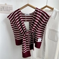 Detail of burgundy and white striped knitted shawl with neck knot on a shirt - Burgundy Striped