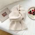 Thick beige knitted scarf in cream color with leather label on soft white bedding - 23*167cm / Cream