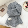 Cozy grey knit scarf with soft brushed texture and Bonogeed label in a flat lay setup - Striped Gray