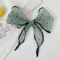 Detailed view of mint green polka dot chiffon bow hair tie with long ribbons - 31*120cm / Ink Dot Green