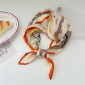 Pleated square scarf in orange and floral pattern tied in a stylish neck knot - White Peony with Orange Border (Pleated 8)