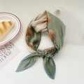 Pleated silk scarf in sage green and cream with orange floral print tied in a bow - Green Ginkgo Leaf Patchwork (Pleated 9)