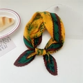 Pleated silk scarf in yellow and green floral print styled as a chic hair accessory - Green Leaves Yellow Background (Pleated 17)