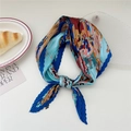 Navy blue pleated scarf with vibrant floral print in a lifestyle setting - Graffiti Fallen Leaves (Pleated 21)