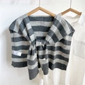 Detail of grey striped knit shawl over a white shirt showing texture and ribbing - 55*104cm / Striped Grey