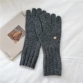 Close-up of thick knitted gloves in dark grey with golden metal logo and ribbed cuff - One Size / Gray