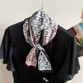 Elegant monogram twilly silk scarf with red and black pattern tied as a bow on a black top - 10 Single Layer Double Sided - Monogram Black / 15*143cm