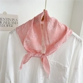 Pink paisley triangle scarf with white lace trim styled on a white shirt collar - Pink