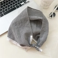 Detail of black and white checkered headband with lace trim and brand label - Black Gingham (DN&KW)
