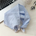Detail of blue gingham triangle scarf with white lace trim and brand woven label - Blue Gingham (DN&KW)