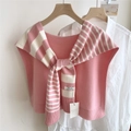 Detailed view of pink and white striped knitted shawl with branding label on white shirt - 53*106cm / Pink Stripe
