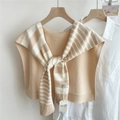 Close-up of beige and white striped knitted shawl with cross-knot design on a hanger - 53*106cm / Apricot Stripe