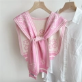 Close-up of pink and white floral knitted shawl with tie-front knot on a white shirt - Pink (Small Flower)
