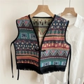 Close-up of ethnic print vest with colorful geometric patterns and black tassel fringe - Colorful Waveguide Embroidery / 46x46cm