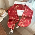 Detail of red satin scarf featuring gold bamboo patterns and white pearl tassel charms - Style 5 Golden Bamboo Red With Beads