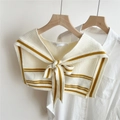 Close-up of beige knitted shawl with yellow stripes and elegant bow tie detail - 44X100CM / Yellow with Beige Stripes