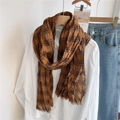 Detail of caramel plaid cotton linen scarf with frayed edges and pleated texture - Orange Plaid