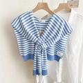 Detail of blue and white striped knitted shawl draped over a white shirt on a hanger - Blue and White Stripes