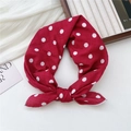 Red cotton bandana with white polka dots shown in a lifestyle flat lay arrangement - Polka Dot Red