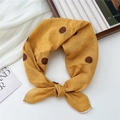 Chic yellow cotton linen scarf with large brown polka dots tied in a knot - Yellow Coin Dot