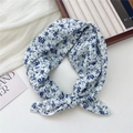 Floral print cotton linen scarf featuring blue ditsy pattern on white fabric - Blue Firethorn Floral