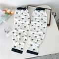 Detail of white cooling arm sleeves with sweet black bow patterns and elastic cuffs - Bowknot Print (8 Simple-Bowknot)