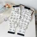 Detail of white sun protection sleeves with cartoon dog print and elastic cuffs - Dog Head (15 Simple-Dog Head)
