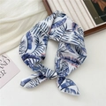 Floral cotton linen headscarf featuring tropical blue and purple leaves on white fabric - Blue Banana Leaf