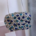 Detail view of the silver evening clutch with blue gemstones and sparkling crystals - Silver Blue Teardrop Gemstone Full Rhinestone Style (77)