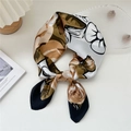 Floral square silk scarf with white blossoms and gold leaves in a knotted bow style - 1 Oil Paint Rose Camel