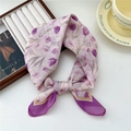 Elegant purple tulip print linen scarf tied in a stylish knot on a lifestyle background - Tulip Duo Frame Purple