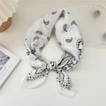White paisley silk square scarf with classic black cashew print and elegant knotted style - Beige Paisley