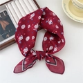 Burgundy cotton linen neckerchief with blue and white floral print tied in a bow - Multi-Petal White Daisy Red