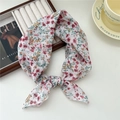 Floral cotton linen neck scarf with red and yellow flowers tied in a bow - Red Raspberry