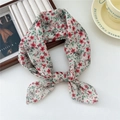 Chic cream-colored linen scarf with red floral print and elegant knotted styling - Red Flower Golden Sunflower