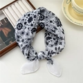 Elegant black and white floral print cotton linen scarf tied as a stylish hair accessory - Three-Leaf Hollow Flower White