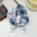 Breathable cotton linen square scarf with navy blue chain print in a tied bow style - Motorcycle Chain Off-white