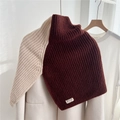Macro shot of two-tone high-collar knit neck warmer details and ribbed texture - Brown and Beige
