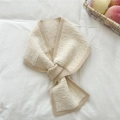 Detail of cream knitted scarf showing textured wool fabric and ribbed edges close-up - Milk White & Beige