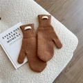 Detail of 100% wool knitted mittens in caramel brown with ribbed cuff for winter warmth - One Size / Caramel color
